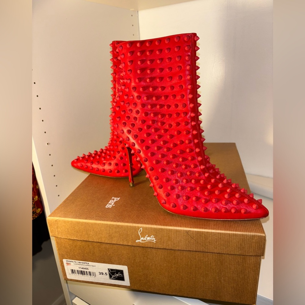 Christian Louboutin Red Spiked Ankle Boots pre-loved but in good condition.